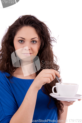 Image of beautiful young woman with cup of coffee 