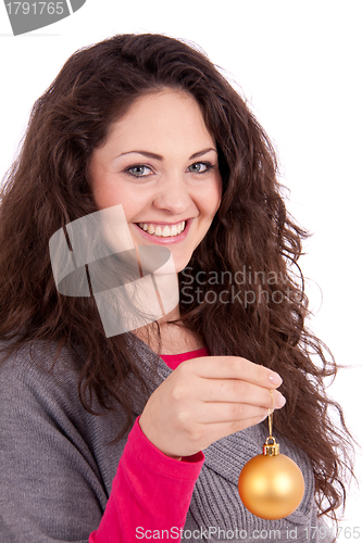 Image of beautiful brunette smiling woman with christmas decoration