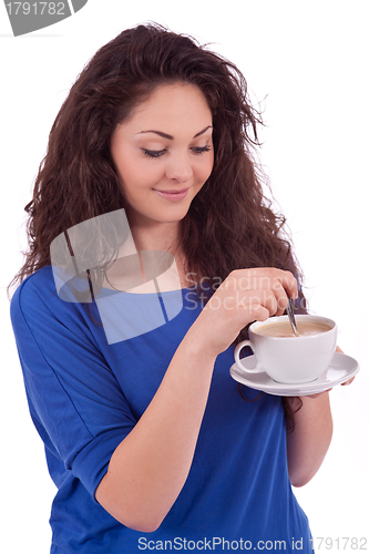 Image of beautiful young woman with cup of coffee 