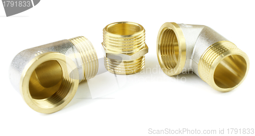 Image of Three brass fitting on a white background