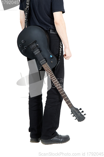 Image of performer with an electric guitar