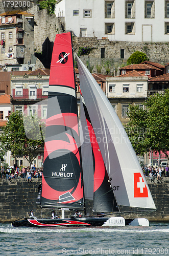 Image of Alinghi compete in the Extreme Sailing Series