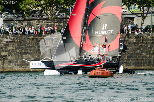 Image of Alinghi compete in the Extreme Sailing Series