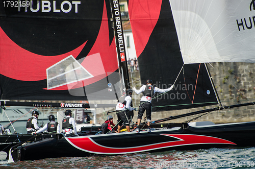 Image of Alinghi compete in the Extreme Sailing Series