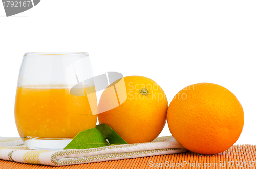 Image of Cup of orange juice and fresh orange