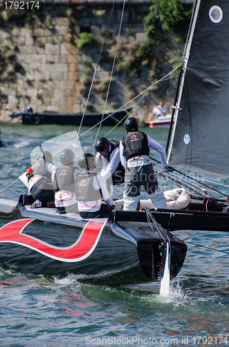 Image of Alinghi compete in the Extreme Sailing Series