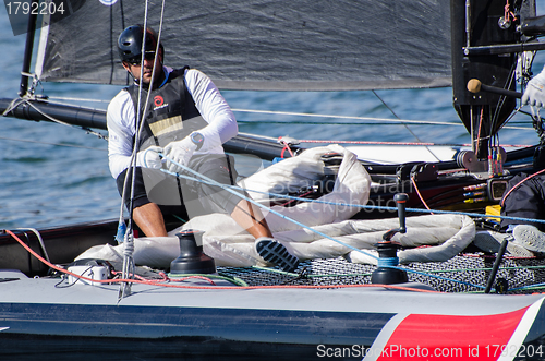 Image of Alinghi compete in the Extreme Sailing Series