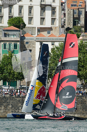 Image of Alinghi compete in the Extreme Sailing Series