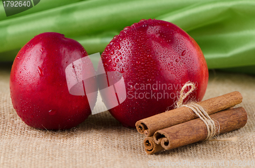 Image of Peaches  and cinnamon sticks