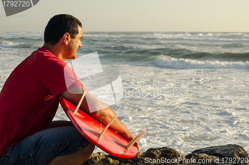 Image of Surfer watching the waves