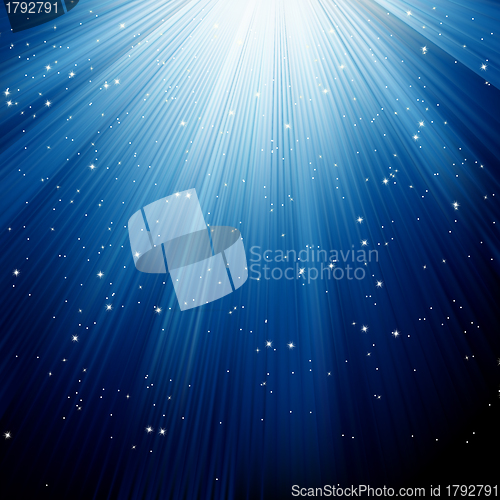 Image of Snowflakes and stars descending blue light. EPS 8