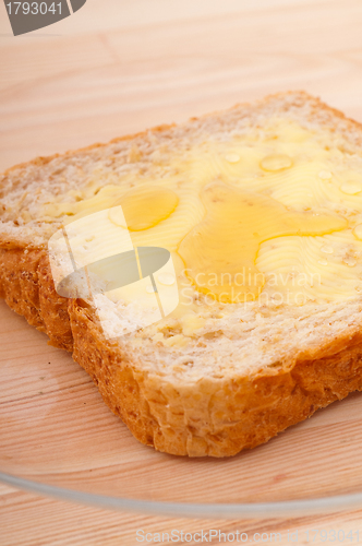 Image of bread butter and honey