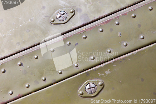 Image of metal surface with rivets