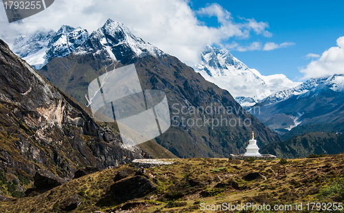 Image of Buddhist stupe or chorten and Lhotse peaks in Himalayas