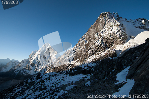 Image of Cho La pass peaks at dawn in Himalaya mountains