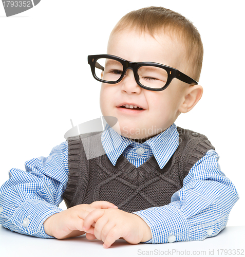 Image of Portrait of a cute little boy wearing glasses