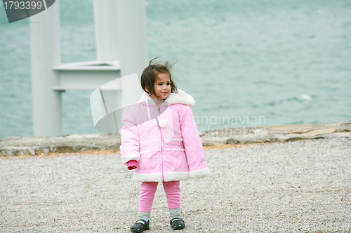 Image of Little girl wearing winter outwear