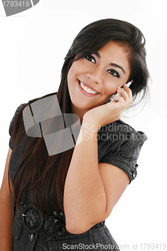 Image of Closeup of beautiful young woman speaking on cell phone