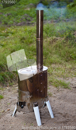 Image of Modular wood-burning stove for tourism
