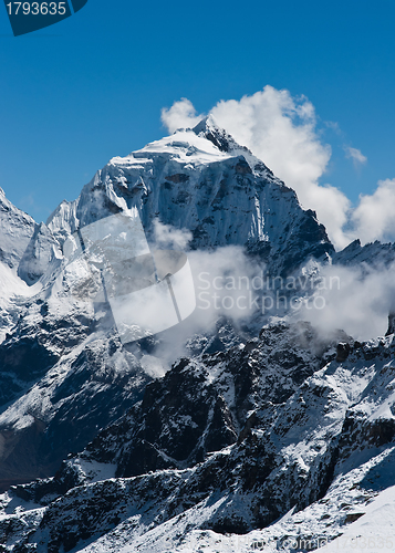 Image of Taboche mountain peak and clouds viewed from Renjo pass