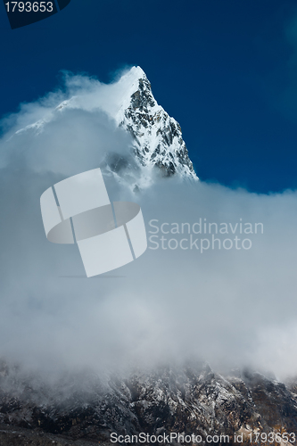 Image of Cholatse mountain peak and clouds