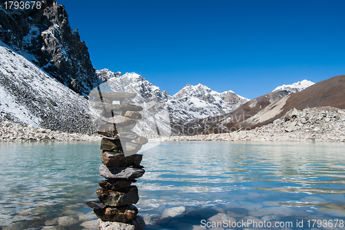 Image of Harmony: Stone stack and Sacred Gokyo Lake