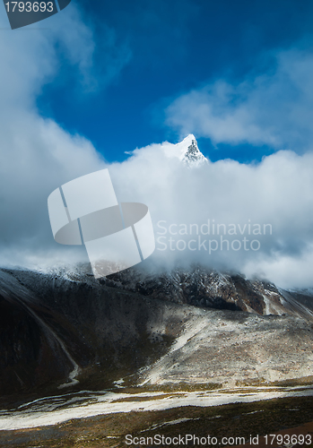 Image of Cholatse summit 6335 m hidden in clouds