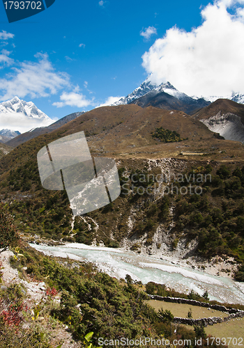 Image of Himalayas: stream and Lhotse, Lhotse shar peaks