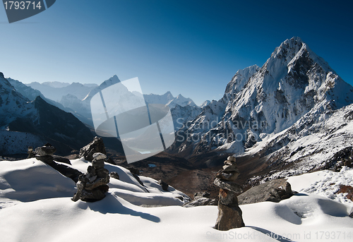 Image of Cho La pass and stone stacks at daybreak in Himalayas