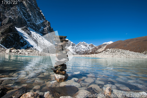 Image of Buddhism: Stones and Sacred Lake near Gokyo