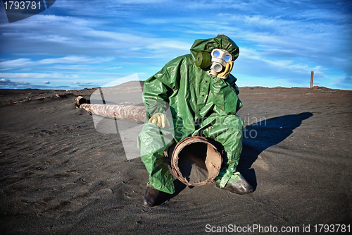 Image of Man in the area of â€‹â€‹environmental disaster