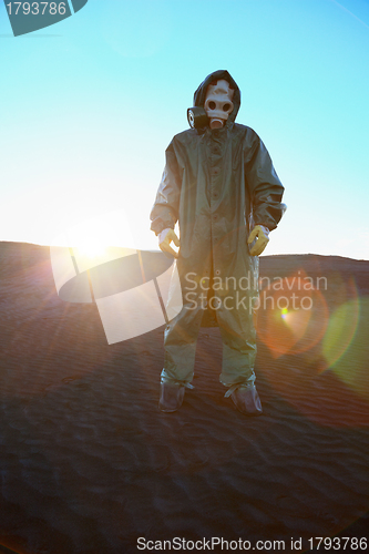 Image of Man in protective suit and rays of sun