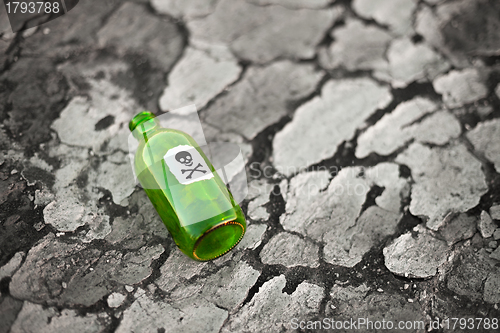 Image of Bottle on poisoned ground