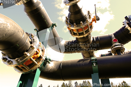 Image of Equipment, cables and piping as found inside of  industrial powe