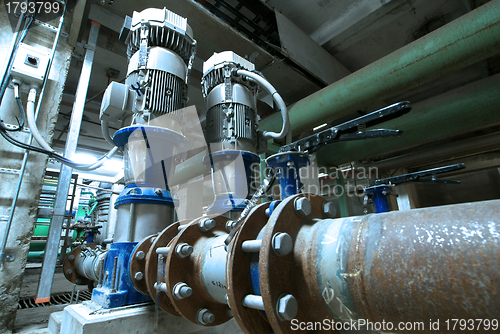 Image of Equipment, cables and piping as found inside of  industrial powe