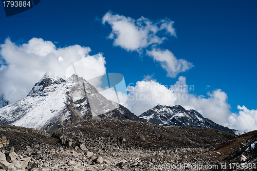 Image of Summit and clouds near Sacred Lake of Gokyo in Himalayas