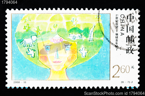 Image of CHINA - CIRCA 2000: A Stamp printed in China shows the earth becoming younger, circa 2000