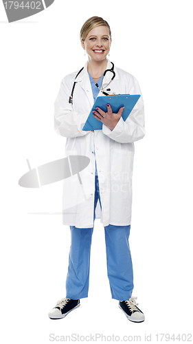 Image of Female doctor writing prescription