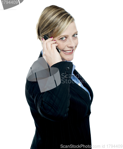Image of Portrait of business lady talking on mobile phone