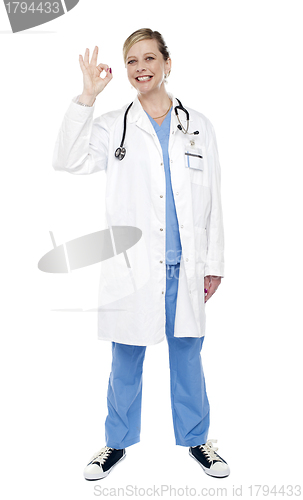 Image of Female medical specialist gesturing ok sign