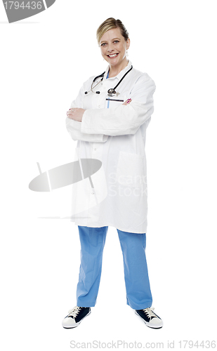 Image of Female physician standing with crossed arms