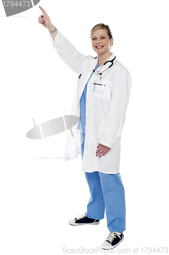 Image of Medical expert pointing finger upwards