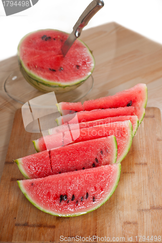 Image of fresh watermelon on a  wood table