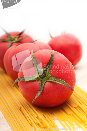 Image of fresh tomato and spaghetti pasta
