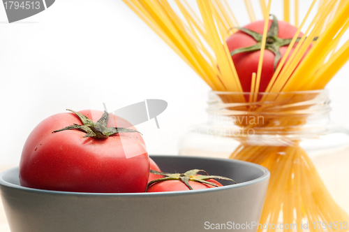 Image of fresh tomato and spaghetti pasta