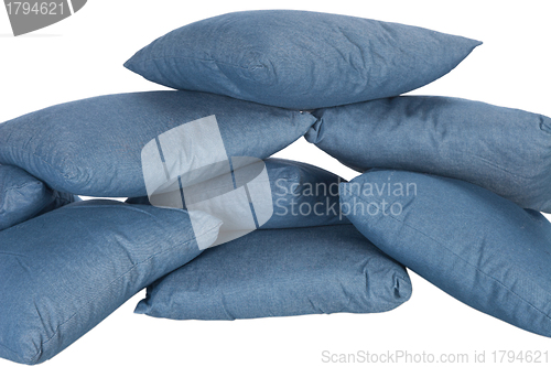 Image of stack of blue denim pillows