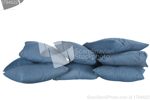 Image of stack of blue denim pillows