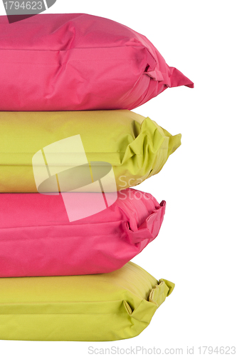 Image of bright pillows isolated on white