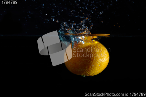 Image of Orange and splash water