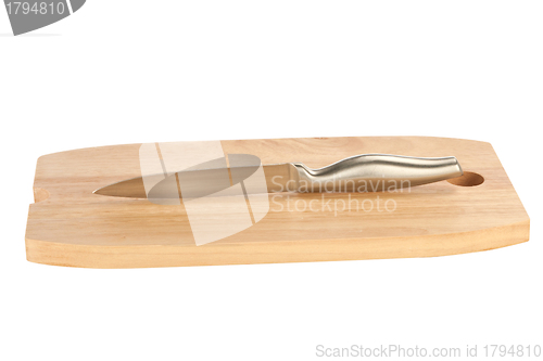 Image of table knife and wooden cutting board